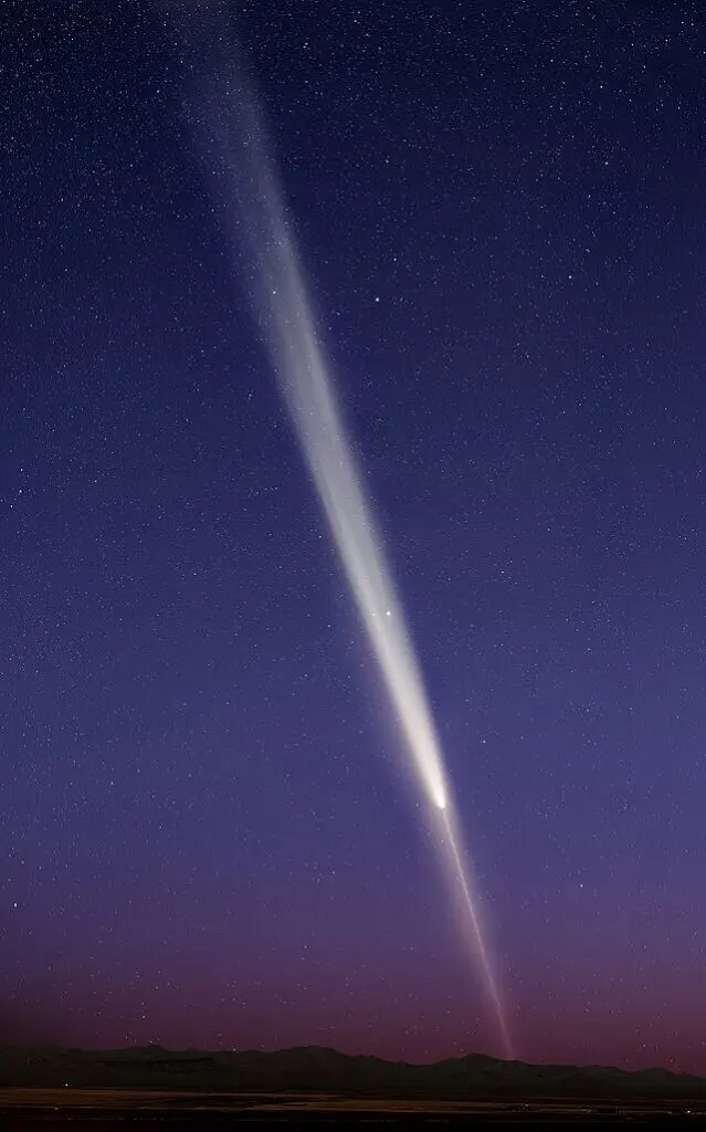 Interstellar comet 3I/ATLAS traveling through space near the Sun.